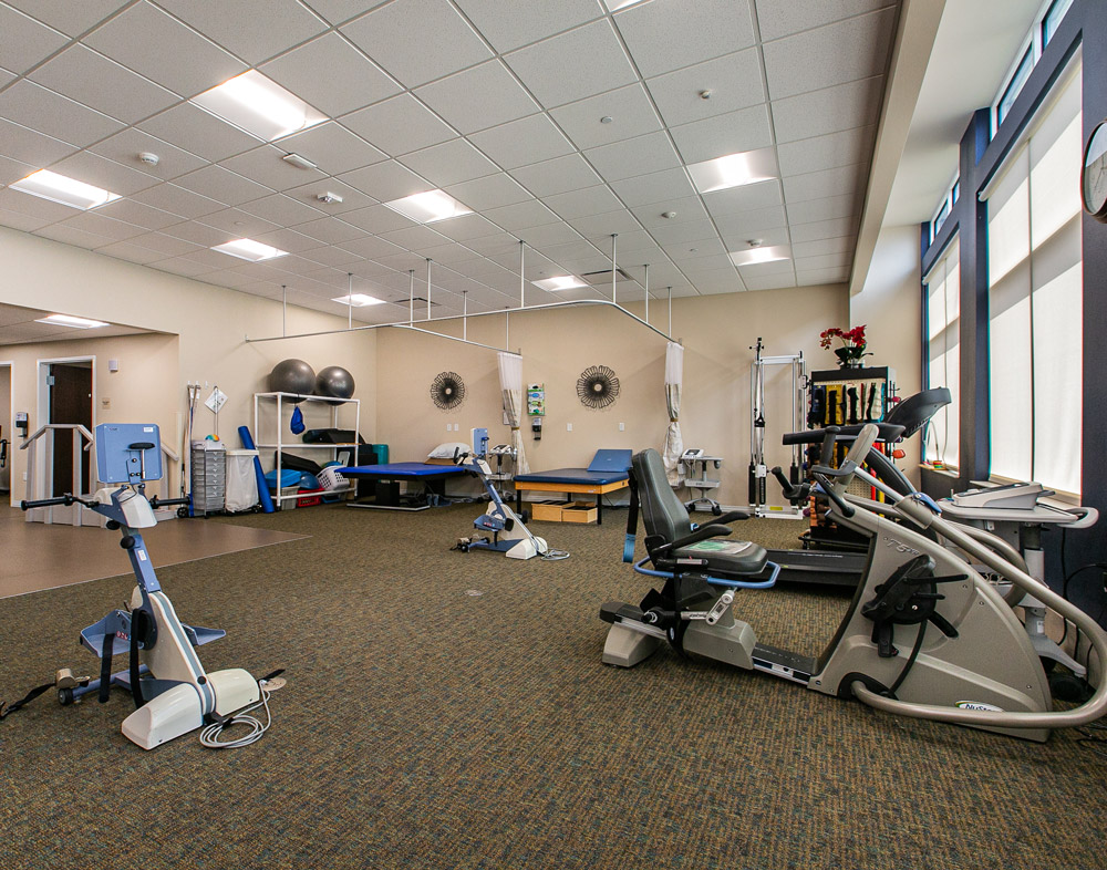 Hawkeye Care Center exercise room showing exercise equipment