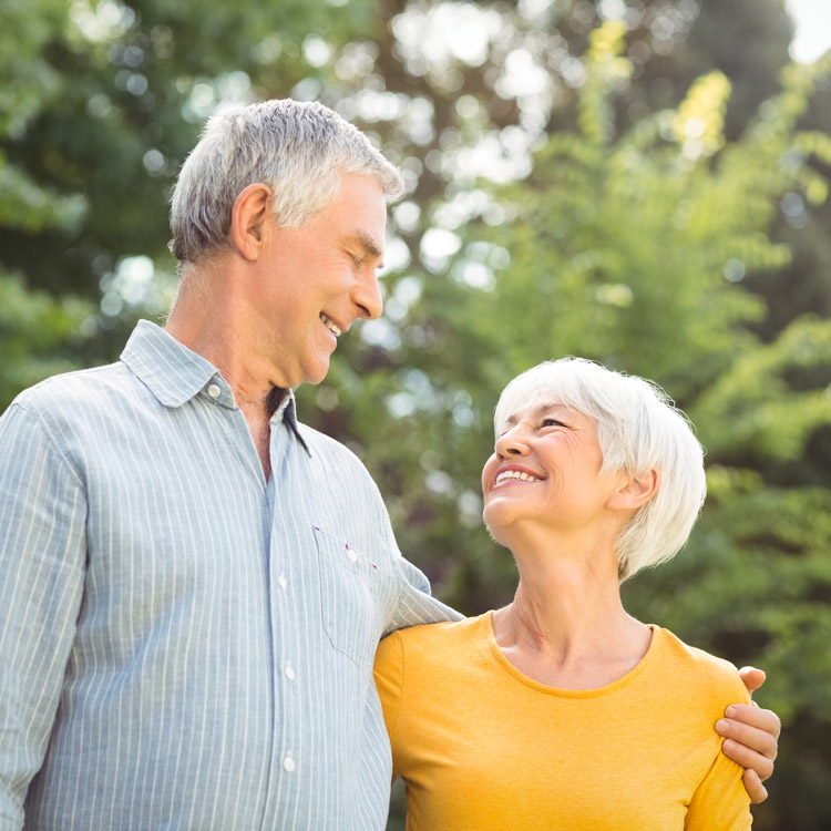 Happy senior couple in a park